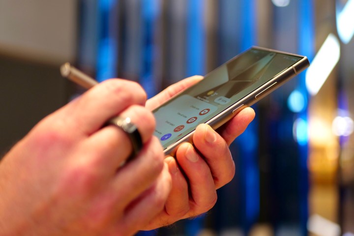 A person using the S Pen stylus with the Samsung Galaxu S24 Ultra.