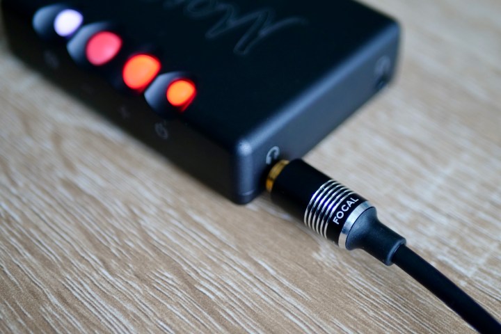 The Chord Mojo 2 connected to a pair of Focal headphones.