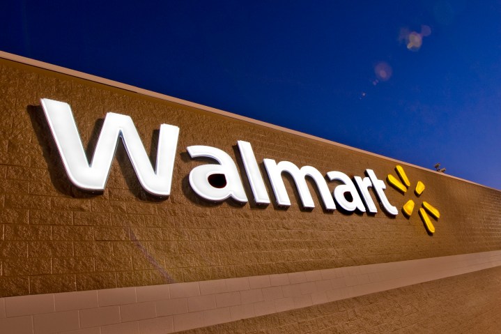 Walmart store logo at night.