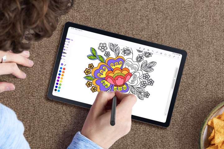 Someone using an S Pen to draw on the Samsung Galaxy Tab S6 Lite 2024.