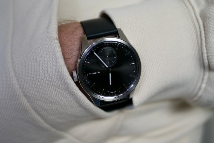 A person wearing the Withings ScanWatch 2.