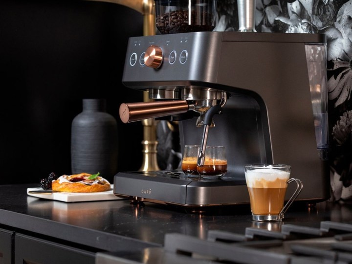 Café Bellissimo semi-automatic espresso machine making a cup of coffee.