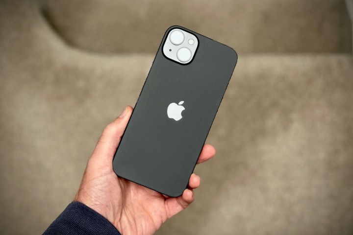 A person holding the Apple iPhone 15 Plus.